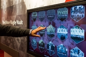 Image of person using interactive media screen at the ulster rugby experience